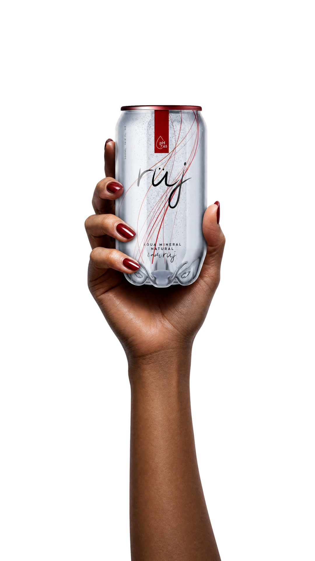 A hand holding a RÜJ natural mineral water can